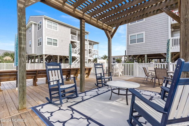 wooden terrace with a pergola