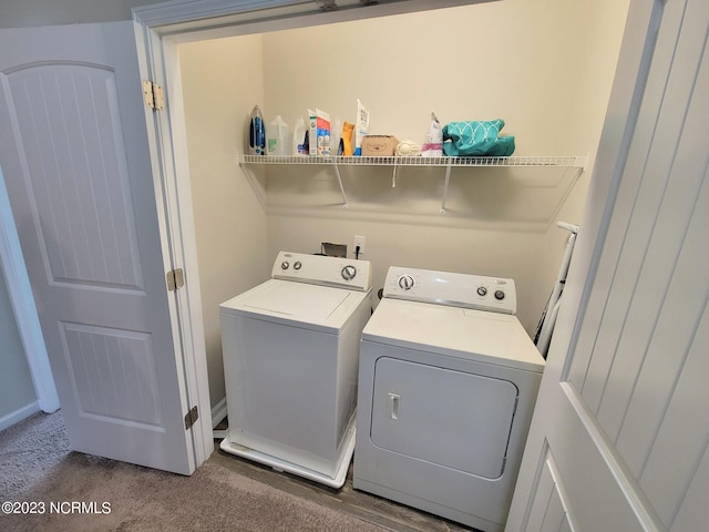 washroom with carpet and washer and clothes dryer