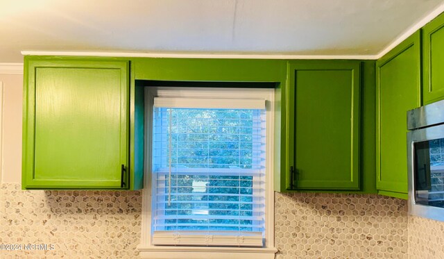 114 Williams St, Seaboard, NC 27876 - kitchen view of green cabinetry and stainless steel microwave