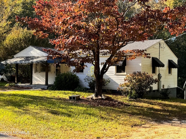 view of property exterior featuring a yard