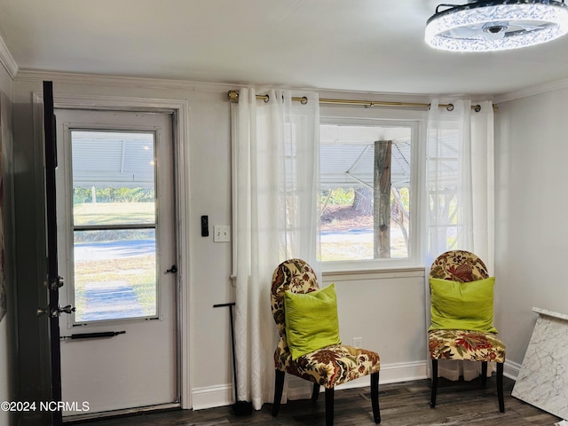 114 Williams St, Seaboard, NC 27876 - doorway with crown molding, dark wood-type flooring, and baseboards