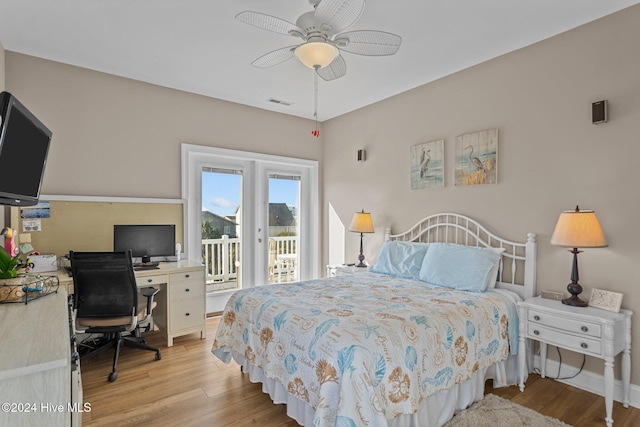 bedroom featuring access to exterior, light wood-type flooring, visible vents, and ceiling fan