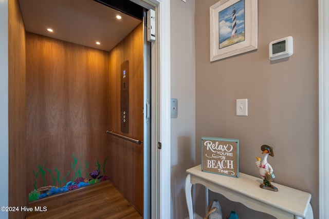 room details featuring elevator and recessed lighting