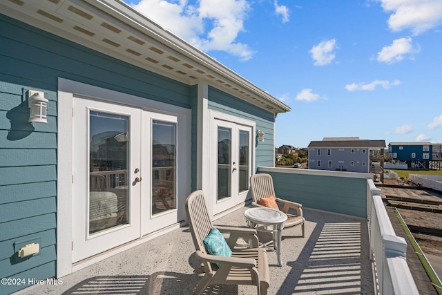 balcony featuring french doors