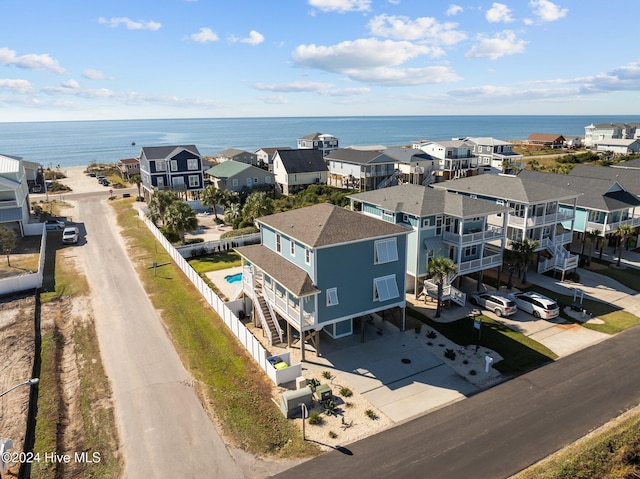 aerial view featuring a residential view and a water view