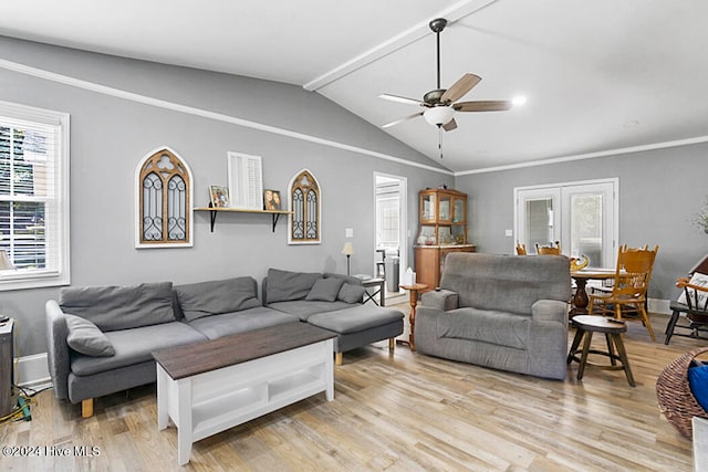 living room with light hardwood / wood-style flooring, vaulted ceiling with beams, and ceiling fan