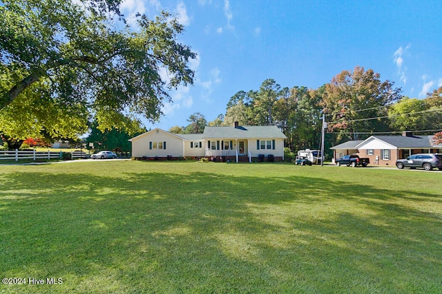 view of front of property with a front lawn