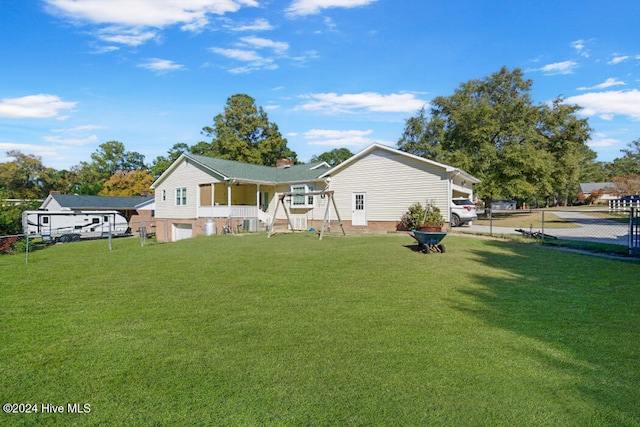 exterior space with a yard and a porch