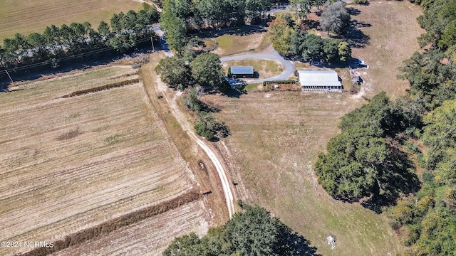 birds eye view of property featuring a rural view