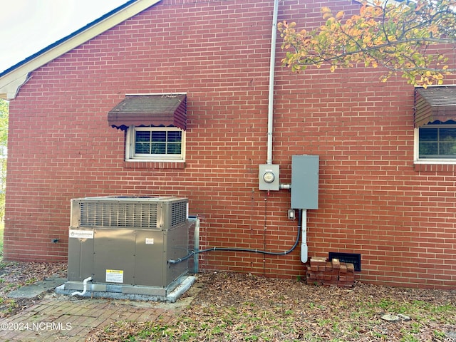 view of property exterior featuring central AC