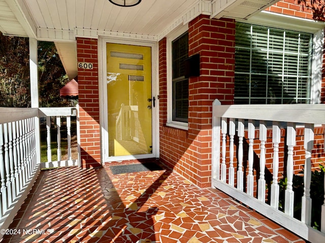 entrance to property with covered porch