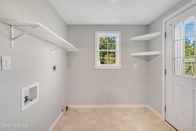 laundry area featuring electric dryer hookup, washer hookup, and plenty of natural light