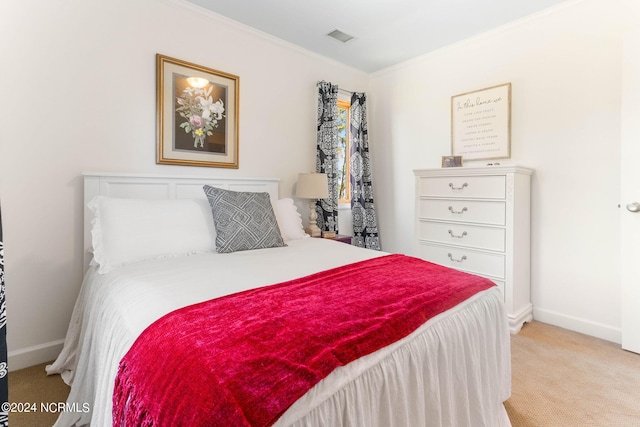 carpeted bedroom with crown molding