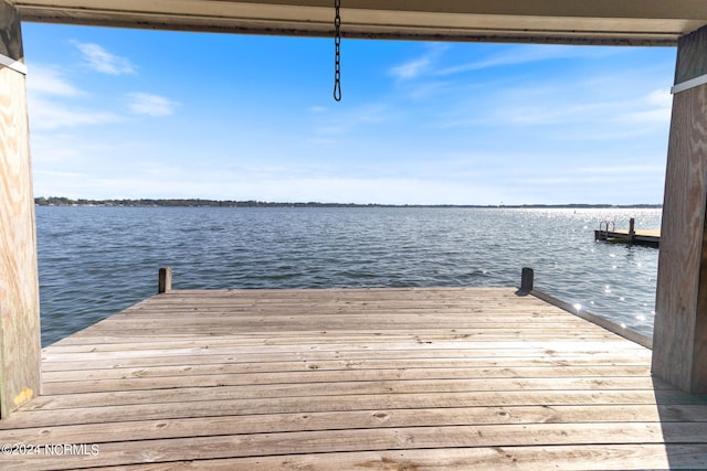 dock area featuring a water view