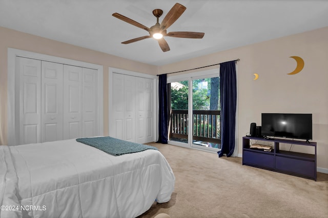 bedroom featuring carpet, baseboards, ceiling fan, multiple closets, and access to outside