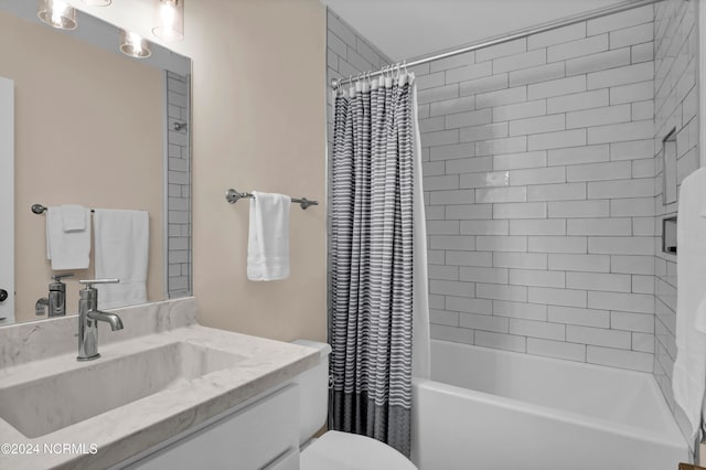 bathroom with vanity, toilet, and shower / tub combo with curtain