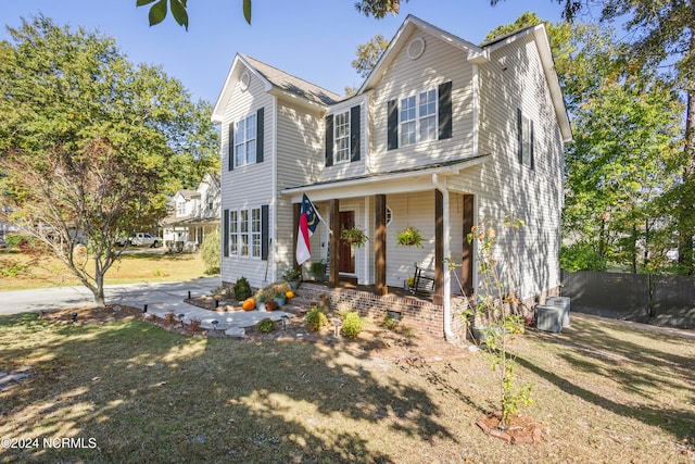 view of front of home featuring a front yard