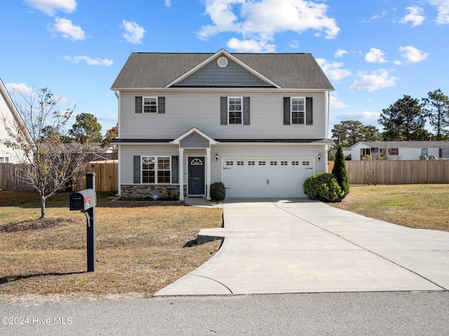 front facade featuring a front lawn and a garage