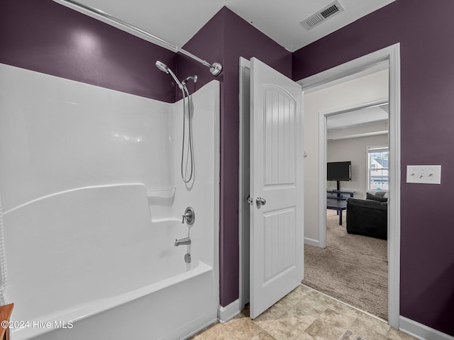 bathroom featuring  shower combination