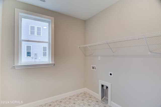 laundry area featuring hookup for a washing machine and electric dryer hookup