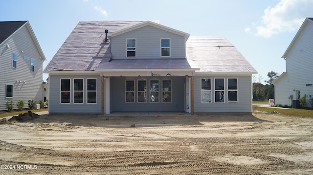 rear view of house featuring a patio