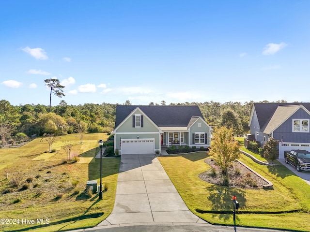 view of front facade with a front lawn and a garage