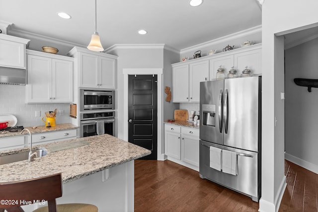 kitchen with white cabinetry, stainless steel appliances, sink, and dark hardwood / wood-style flooring