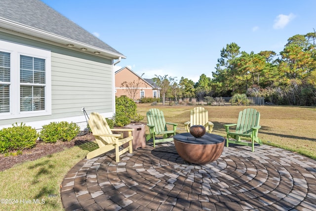 view of patio featuring an outdoor fire pit