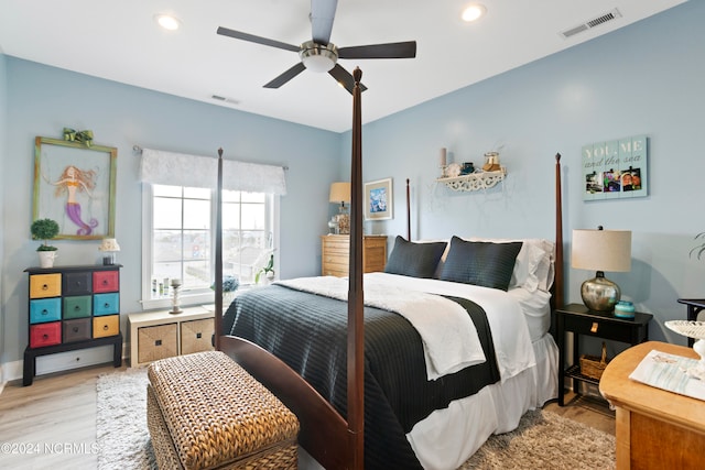 bedroom featuring light hardwood / wood-style floors and ceiling fan