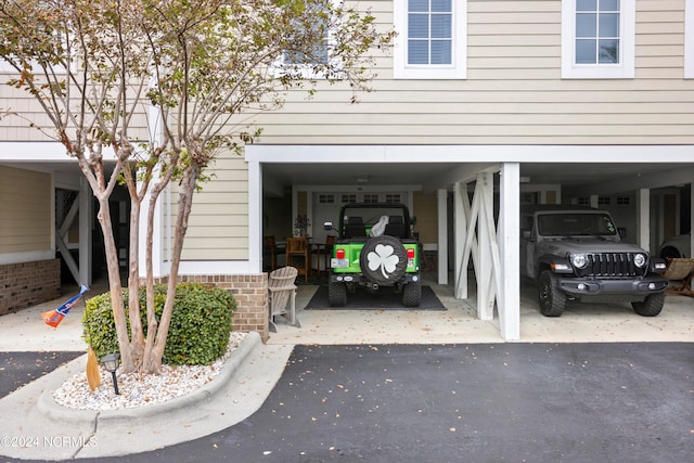 garage featuring a carport