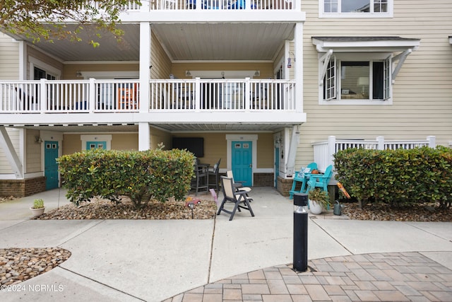 exterior space with a balcony and a patio area