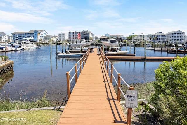 view of dock with a water view