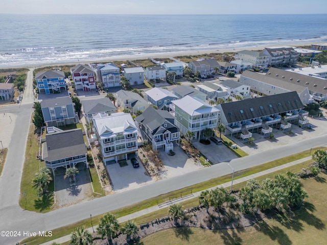 bird's eye view with a water view, a residential view, and a view of the beach