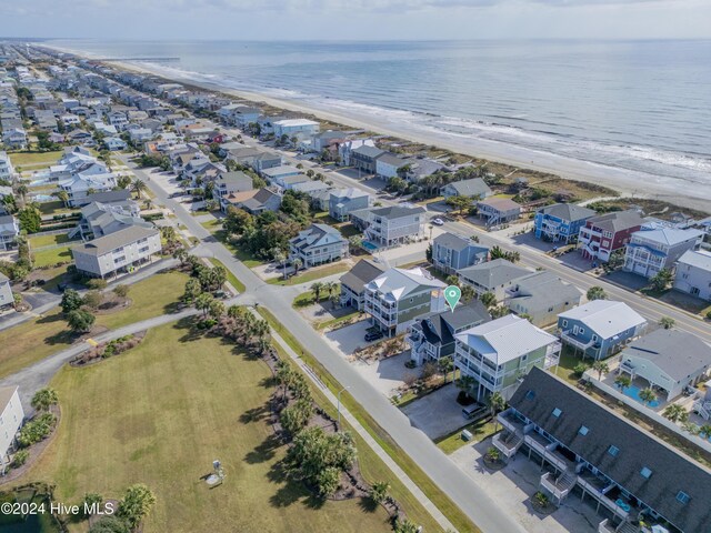 bird's eye view with a beach view and a water view