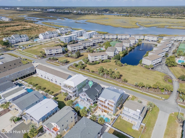 bird's eye view with a water view and a residential view