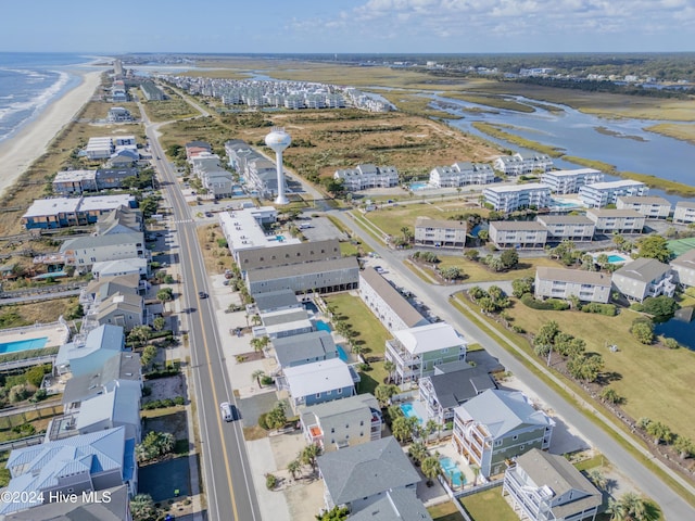 bird's eye view with a water view and a residential view