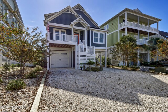 raised beach house with a garage