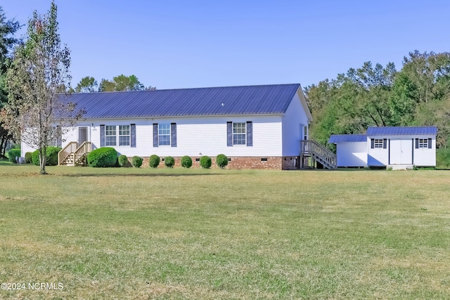 exterior space with a shed and a front yard