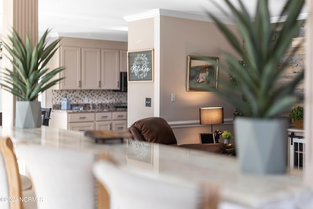 living room with crown molding