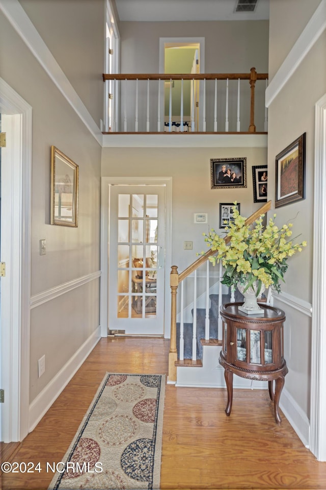 entrance foyer featuring hardwood / wood-style flooring