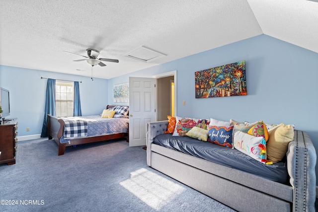 bedroom with ceiling fan, carpet floors, a textured ceiling, and vaulted ceiling