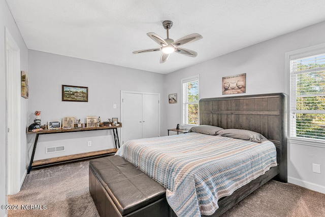 bedroom featuring carpet and ceiling fan