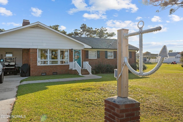 view of front of property with a front lawn