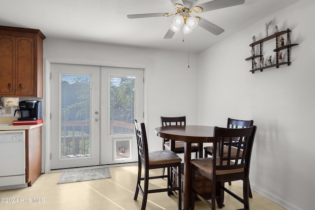 dining room with french doors and ceiling fan