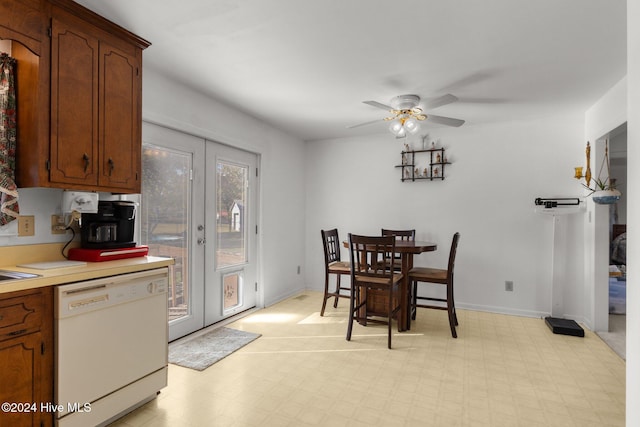 dining area with french doors and ceiling fan