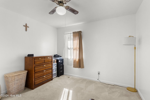 carpeted bedroom with ceiling fan