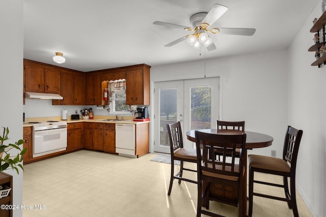 kitchen featuring french doors, ceiling fan, sink, and white appliances