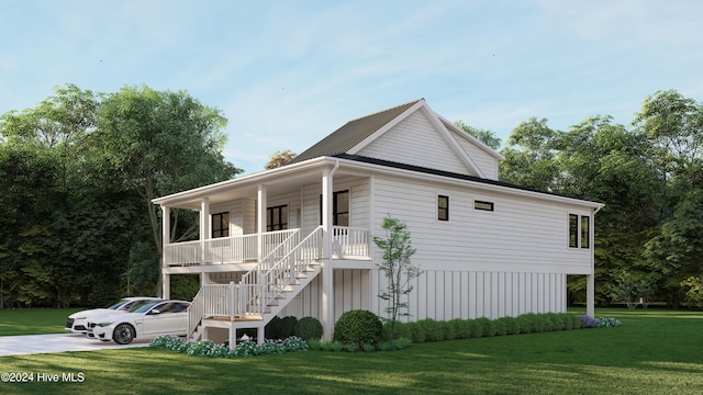 view of front of property with a front lawn and covered porch