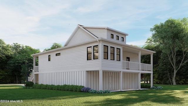 view of home's exterior featuring a balcony and a yard