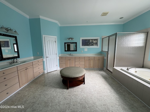 bathroom featuring ornamental molding, separate shower and tub, and vanity